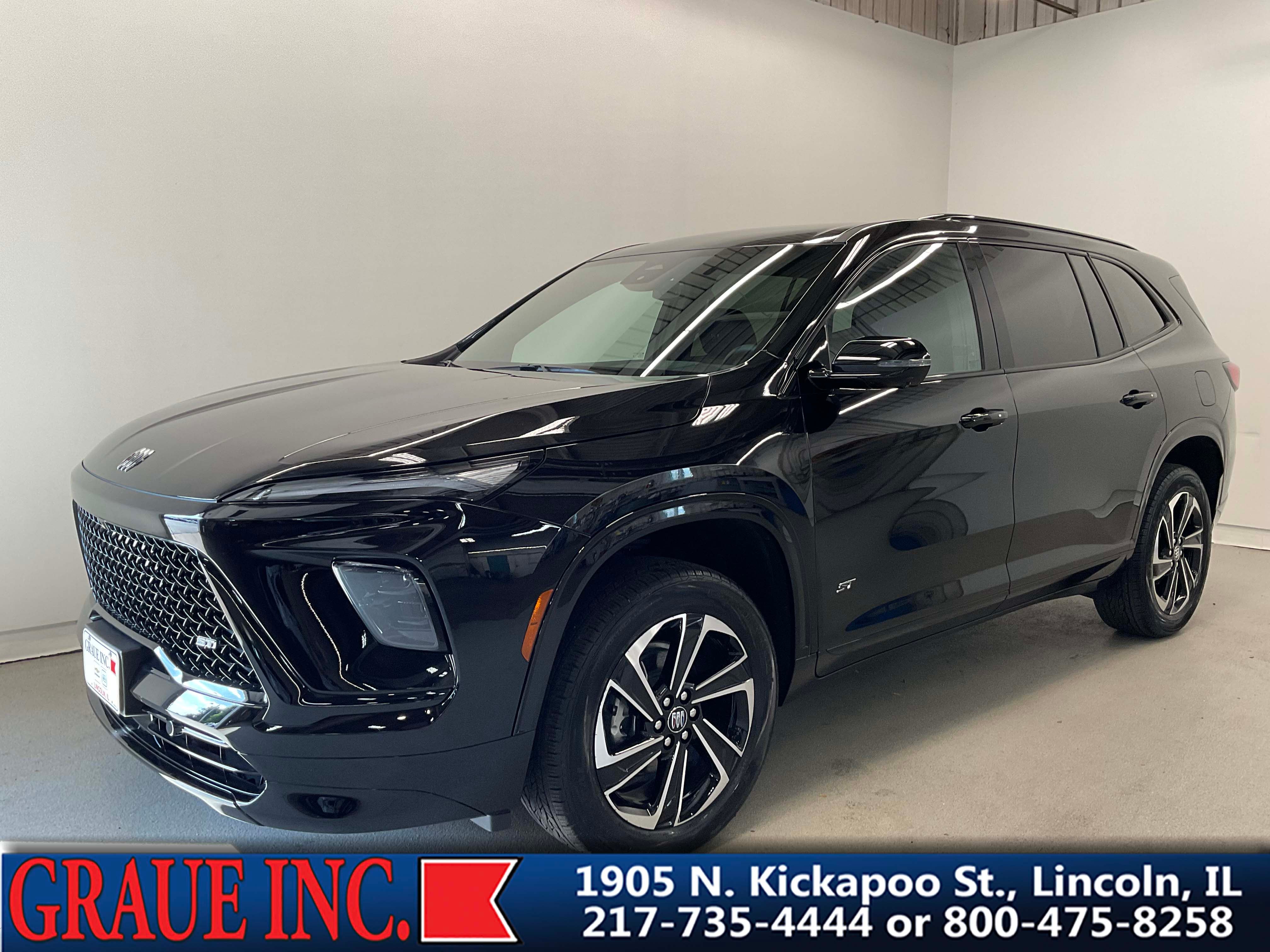 2025 Buick Enclave Sport Touring in Ebony Twilight Metallic — front three-quarter view