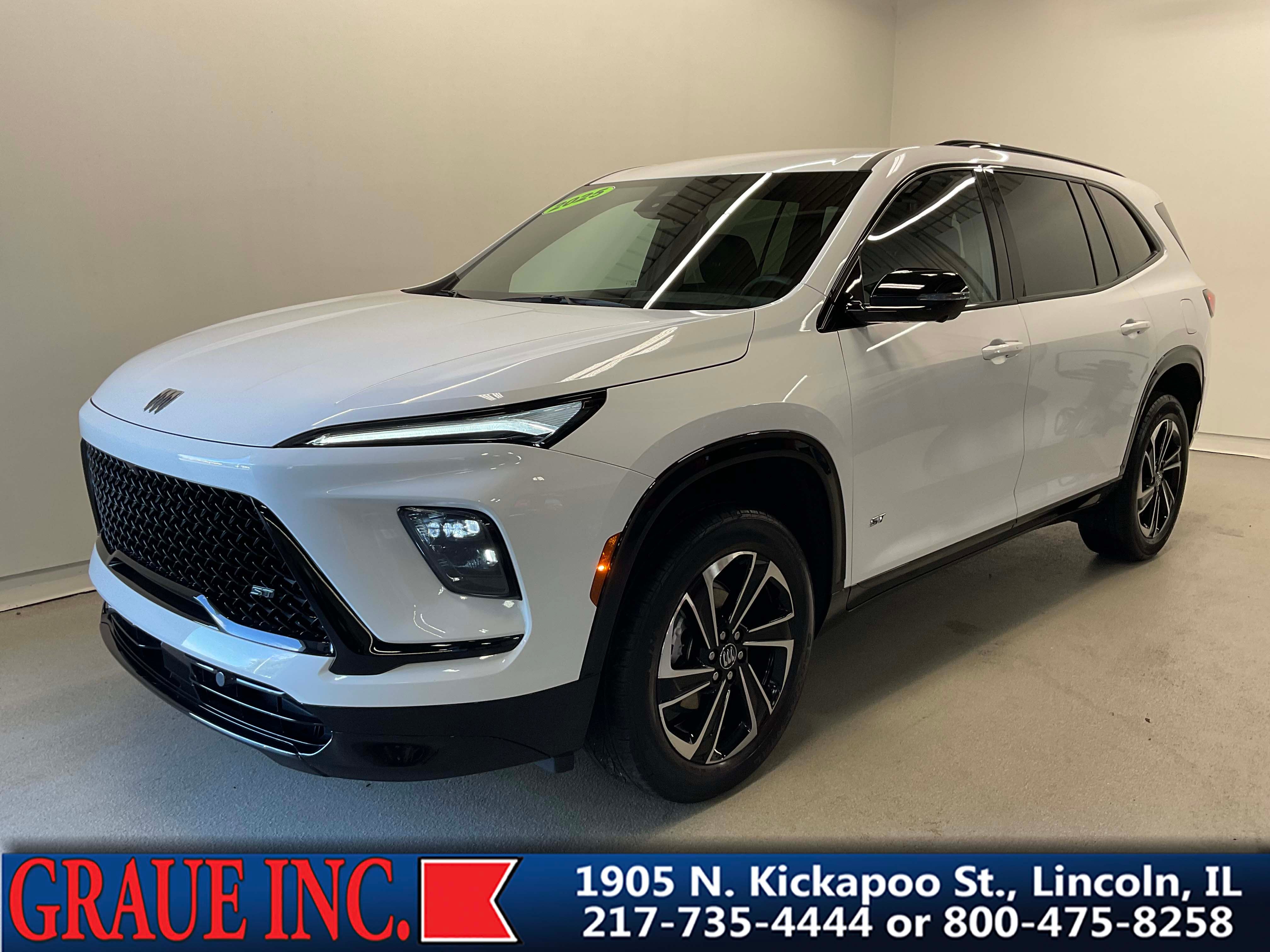 2025 Buick Enclave Sport Touring in Summit White — front three-quarter view